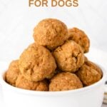 Homemade turkey pumpkin meatballs for dogs piled in a small bowl.