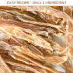 Homemade chicken jerky for dogs on a plate.