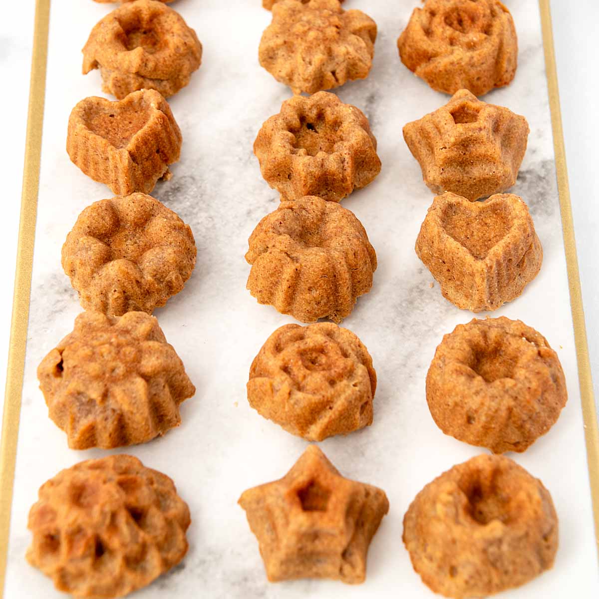Honey almond tea cakes for dogs on a platter.