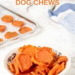 Homemade sweet potato dog chews in a bowl on a marble surface.