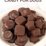 Carob peanut butter candy for dogs in a small shallow bowl.