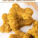 Stacks of homemade bone-shaped turmeric dog treats.