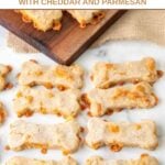 Homemade cheese dog treats on a marble surface.