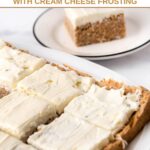 Homemade applesauce cake for dogs with cream cheese frosting sliced and served.