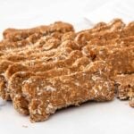 Homemade brewer's yeast dog treats in a bone shape.