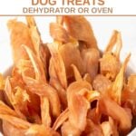 A bowl of homemade dehydrated chicken wrapped sweet potato dog treats.