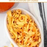 Homemade dehydrated dog treats in a small dish.