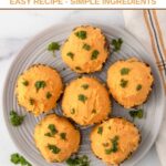 Meatloaf pupcakes with sweet potato frosting garnished with curly parsley.