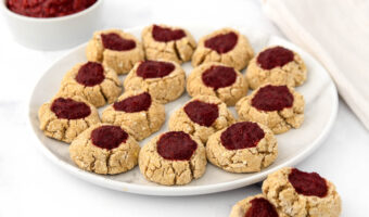Homemade thumbprint cookies for dogs with strawberry jam.