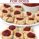 Homemade thumbprint cookies for dogs with strawberry filling.