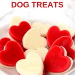 A plate of heart-shaped frozen raspberry and yogurt dog treats.