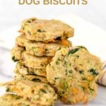 Homemade breakfast dog biscuits in a stack and one in front of it.