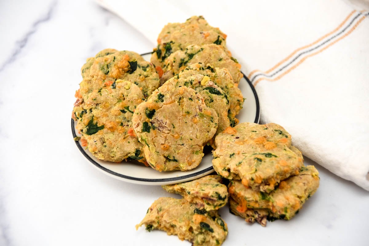Homemade biscuits for dogs made with eggs, bacon, cheese, and spinach.