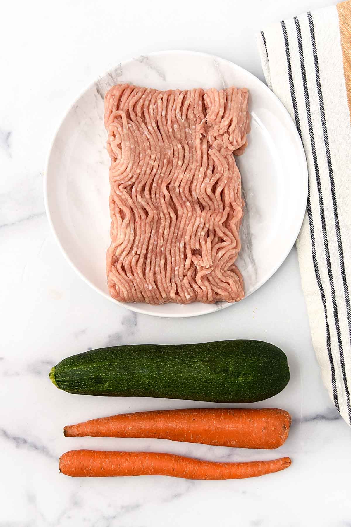 ground chicken, zucchini, and carrots.