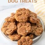 Paw-shaped homemade dog treats made with applesauce.