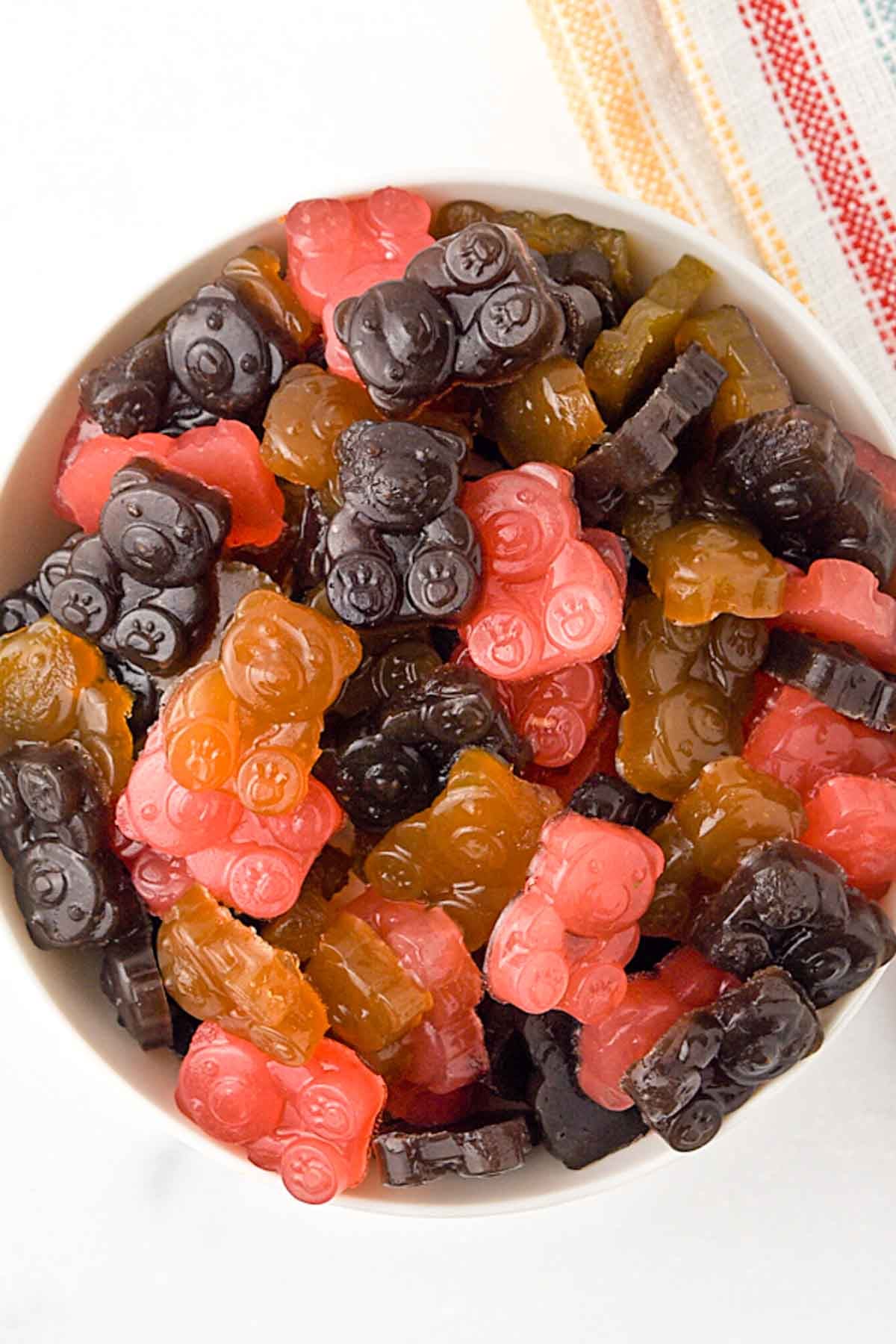 A bowl of fruity gummy bears.