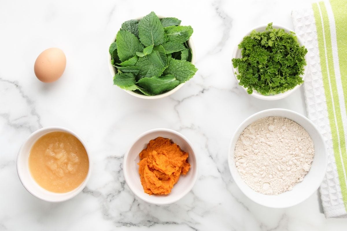 Fresh mint leaves, curly parsley, egg, applesauce, pumpkin puree, and oat flour.