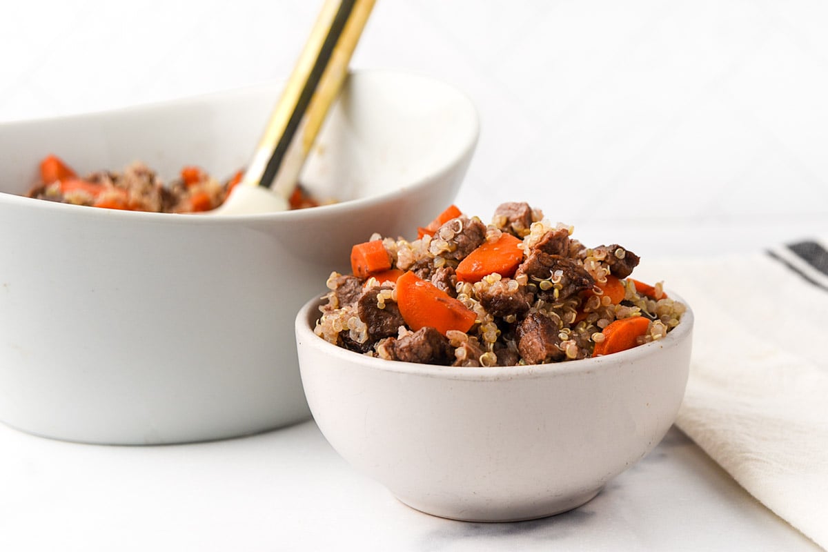 Bowls of air-fried beef and quinoa mixed with quinoa.